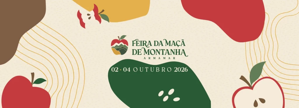 Banner promocional com ilustrações de maçãs vermelhas, verdes e amarelas; texto central anuncia “Feira da Maçã de Montanha Armamar, 02-04 Outubro 2026”.